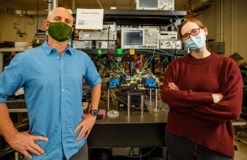Building on previous research, the team led by scientists Matt Eichenfield, left, and Lisa Hackett now has produced acoustic mixers, completing the list of components needed to make a radio frequency front end on a single chip.