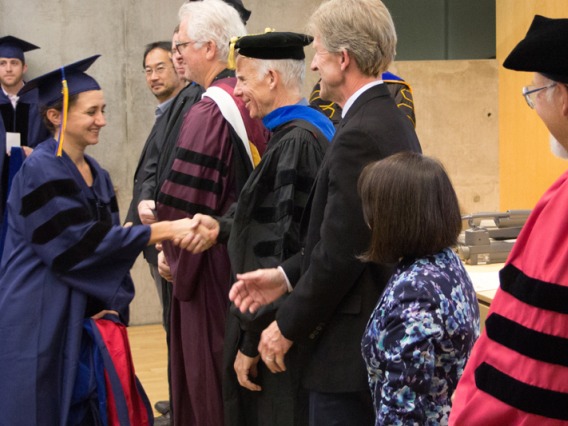 2015 Winter Commencement Student Shaking Hands with Board