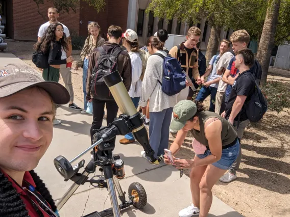 Walter Rahmer captures a few of the solar eclipse viewers out to see the show.
