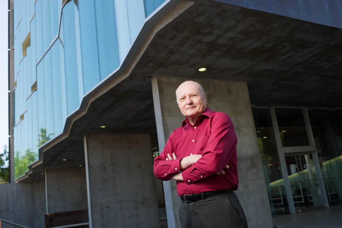 Jim Wyant stands outside of the Wyant College of Optical Sciences, named for the founding dean in 2019.