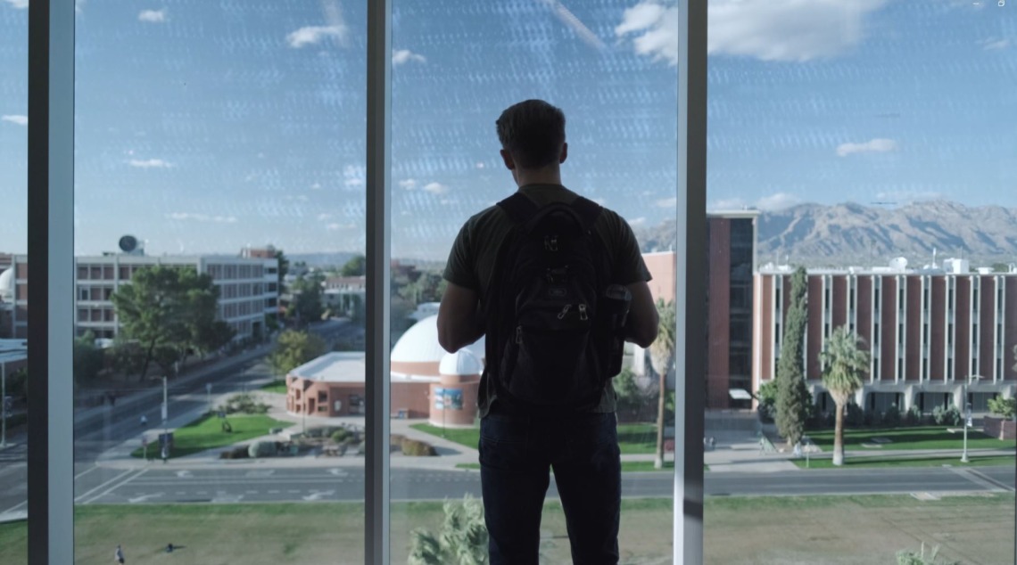 Man Looking Through Window - The University of Arizona Museum of
